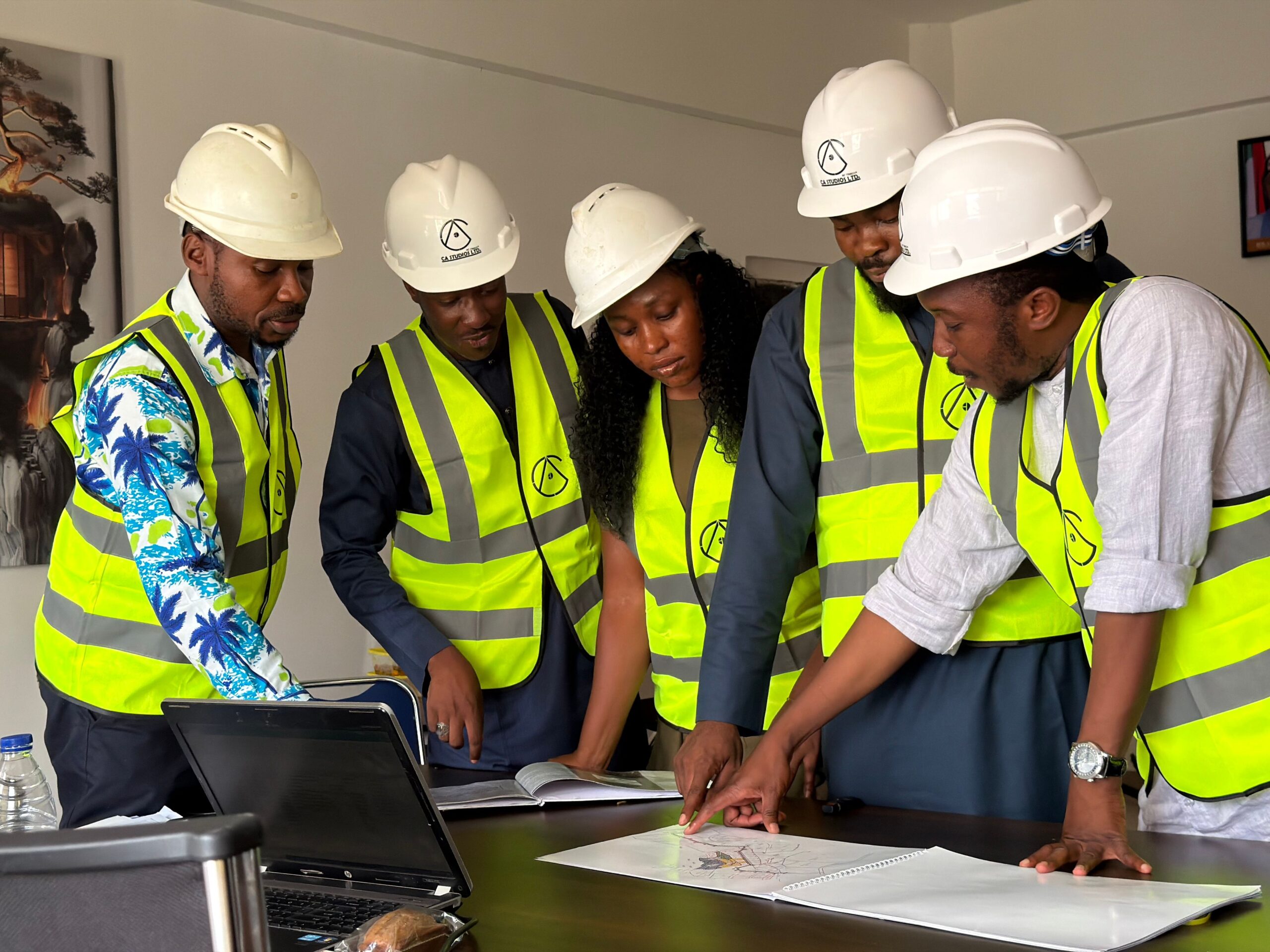 Workers discussing the project