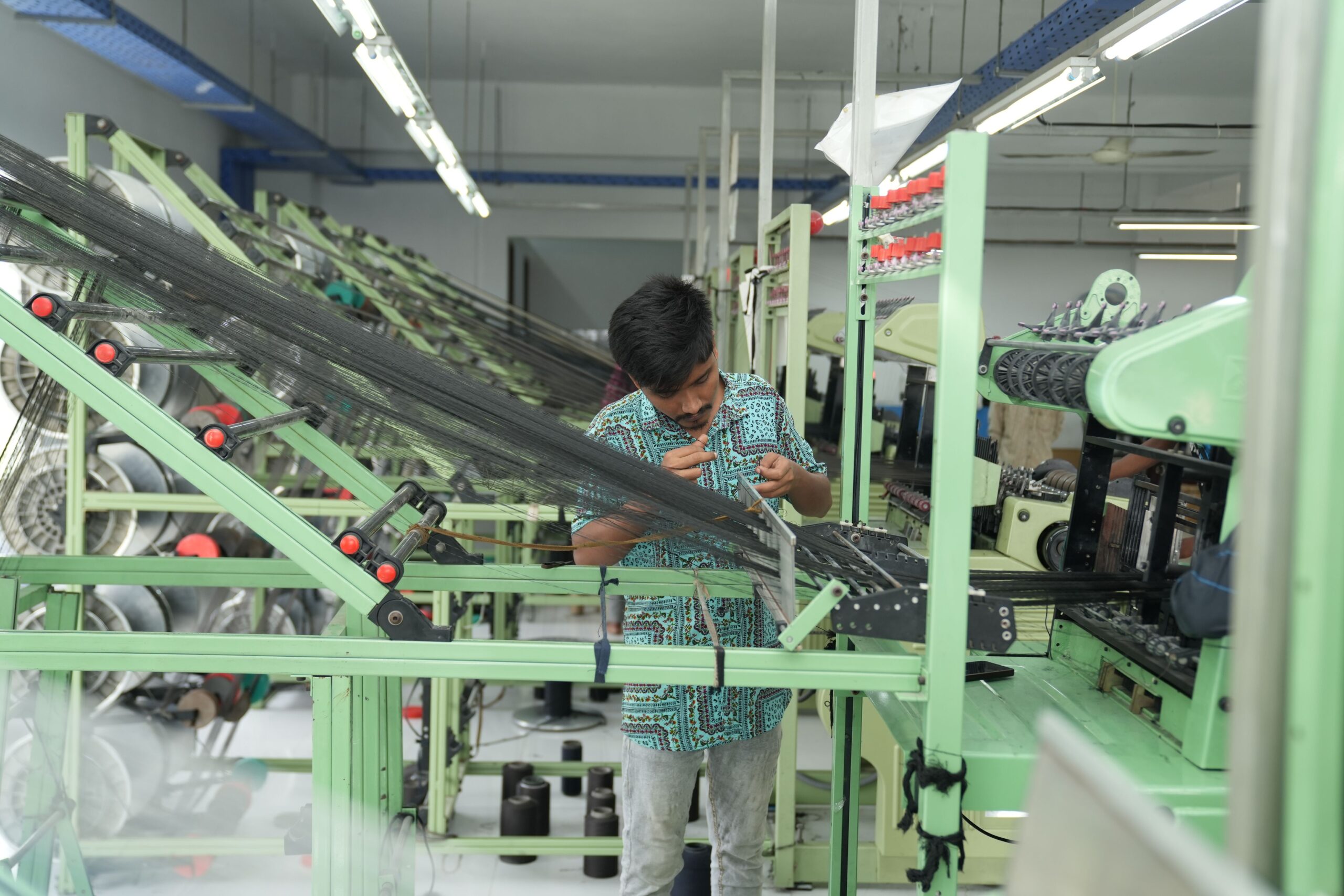 a man working in a manufacturing plant