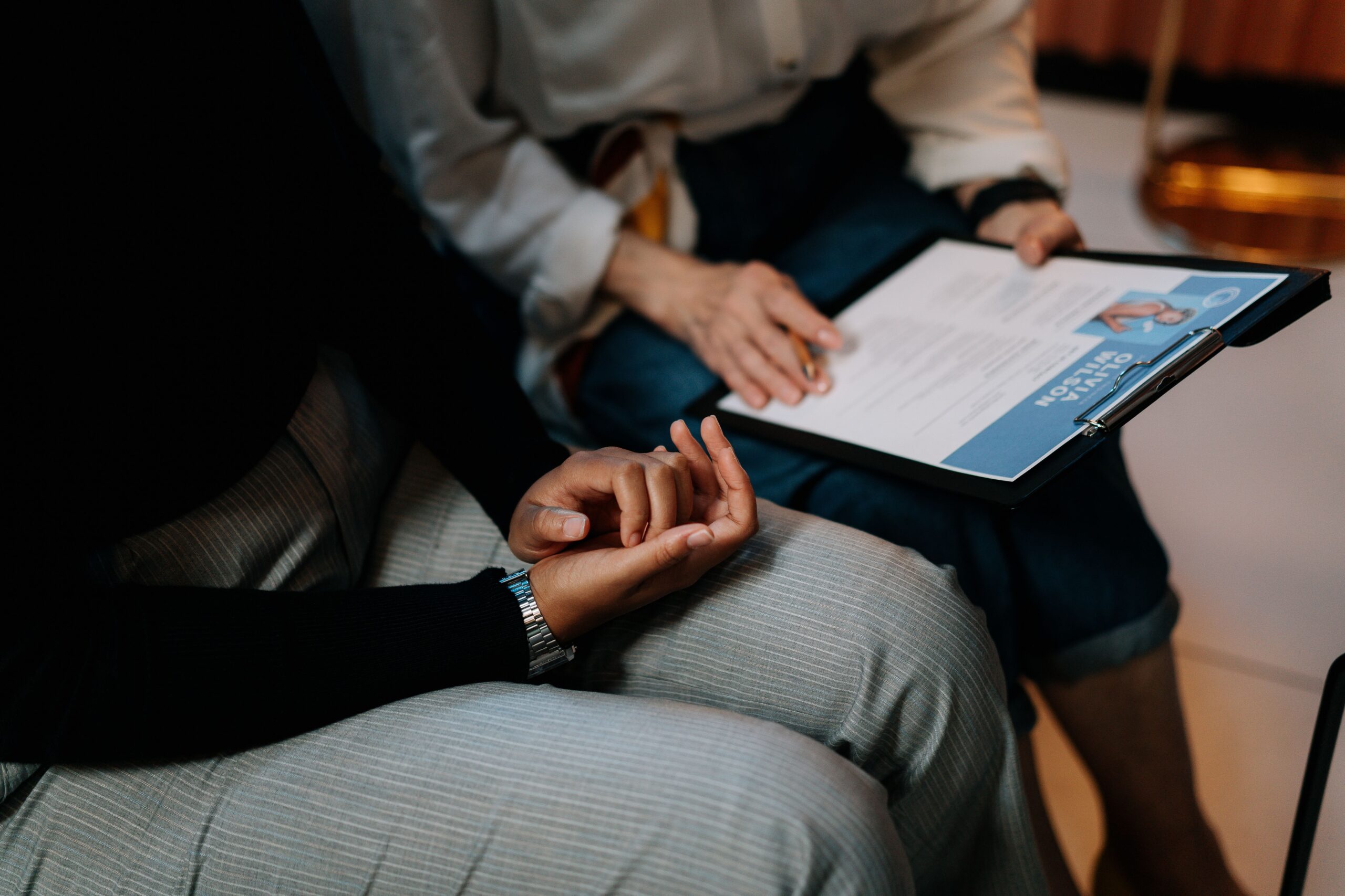 Two people checking the Resume