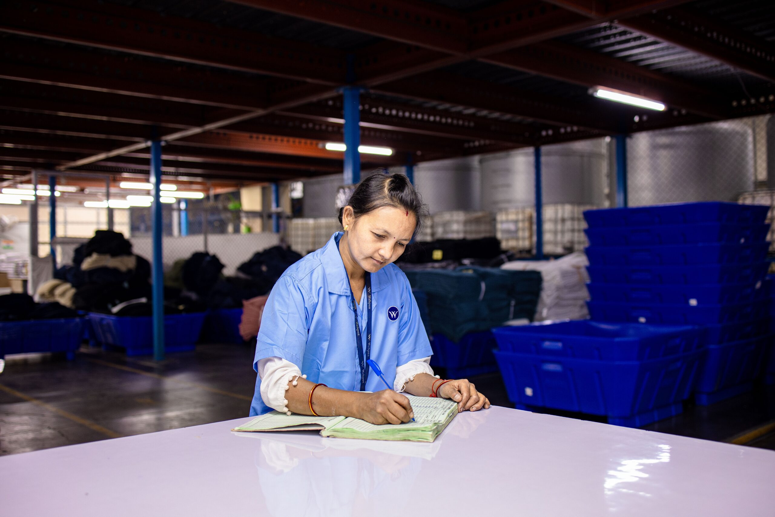 a warehouse worker calculating