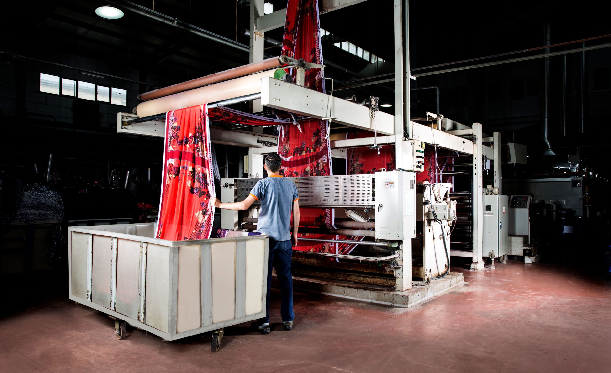 a man working in clothes manufacturing