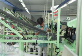 a man working in a manufacturing plant