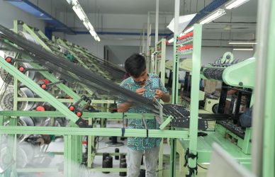 a man working in a manufacturing plant