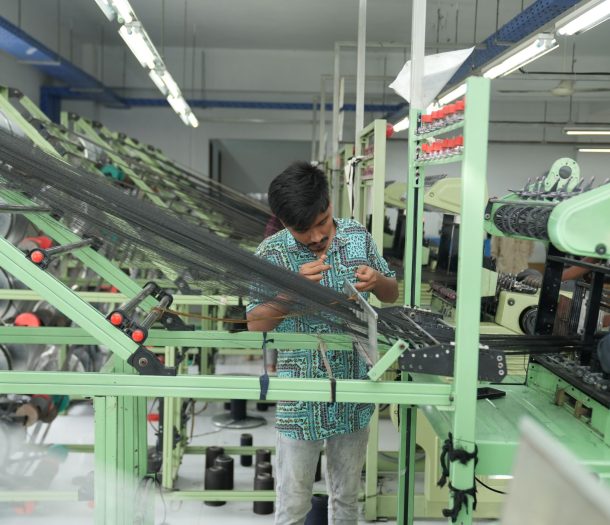 a man working in a manufacturing plant