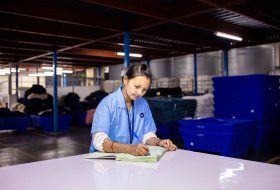 a warehouse worker calculating