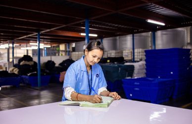 a warehouse worker calculating