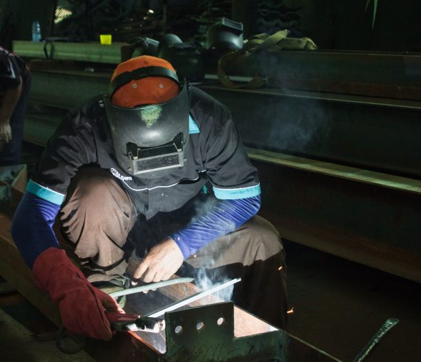 a man welding metal