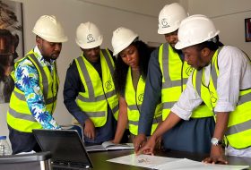 Workers discussing the project