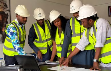 Workers discussing the project