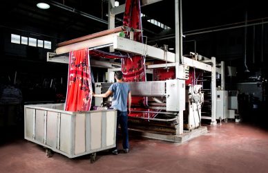a man working in clothes manufacturing