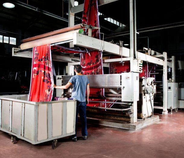 a man working in clothes manufacturing